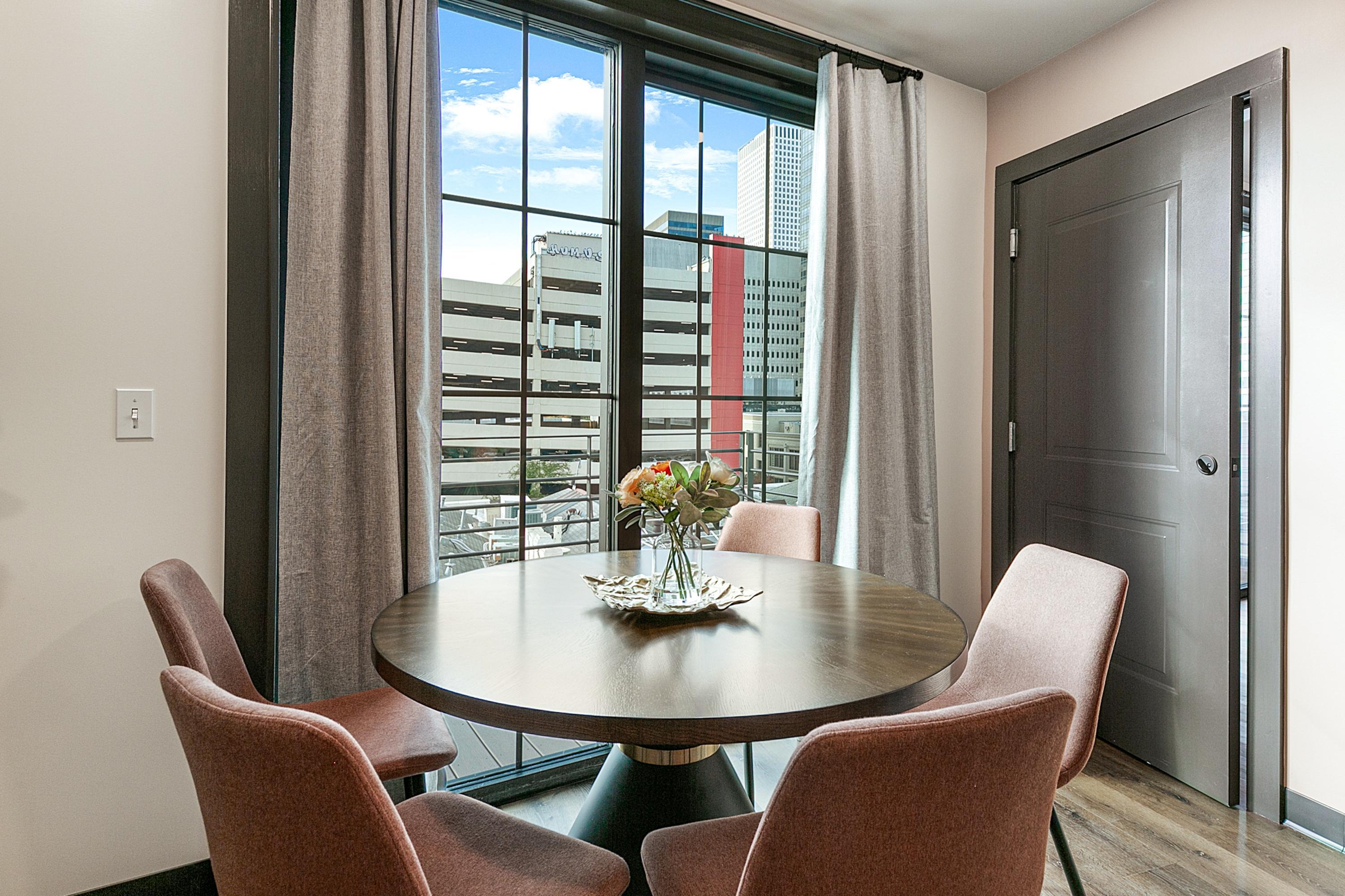 Urban Mirage: 4BR City Oasis with Balcony 5