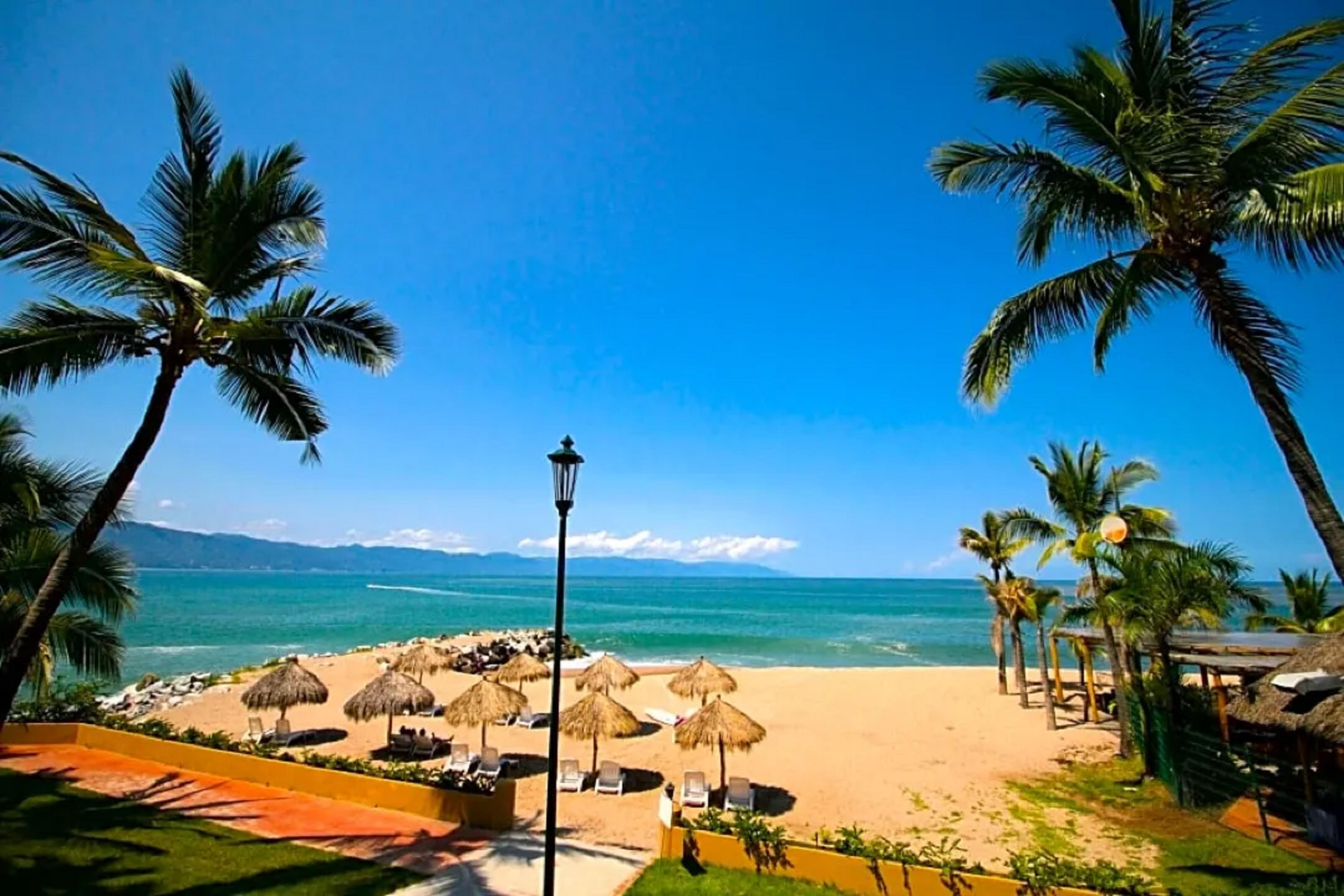 Spacious 2BR Condo with Private Balcony, Pool & Ocean Views