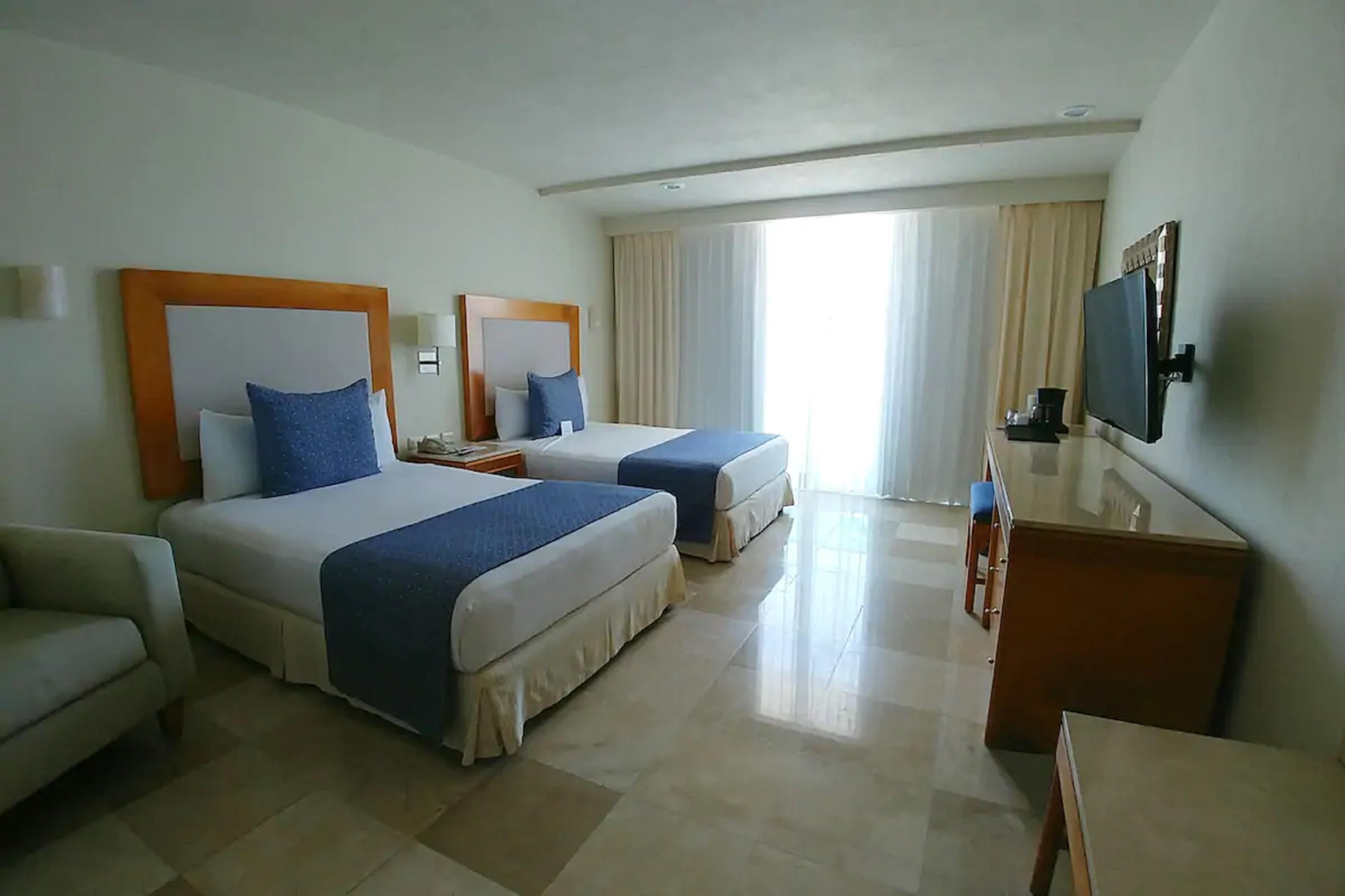 Modern Room w 2 DBL Beds Near Local-favorite Spots in Cozumel